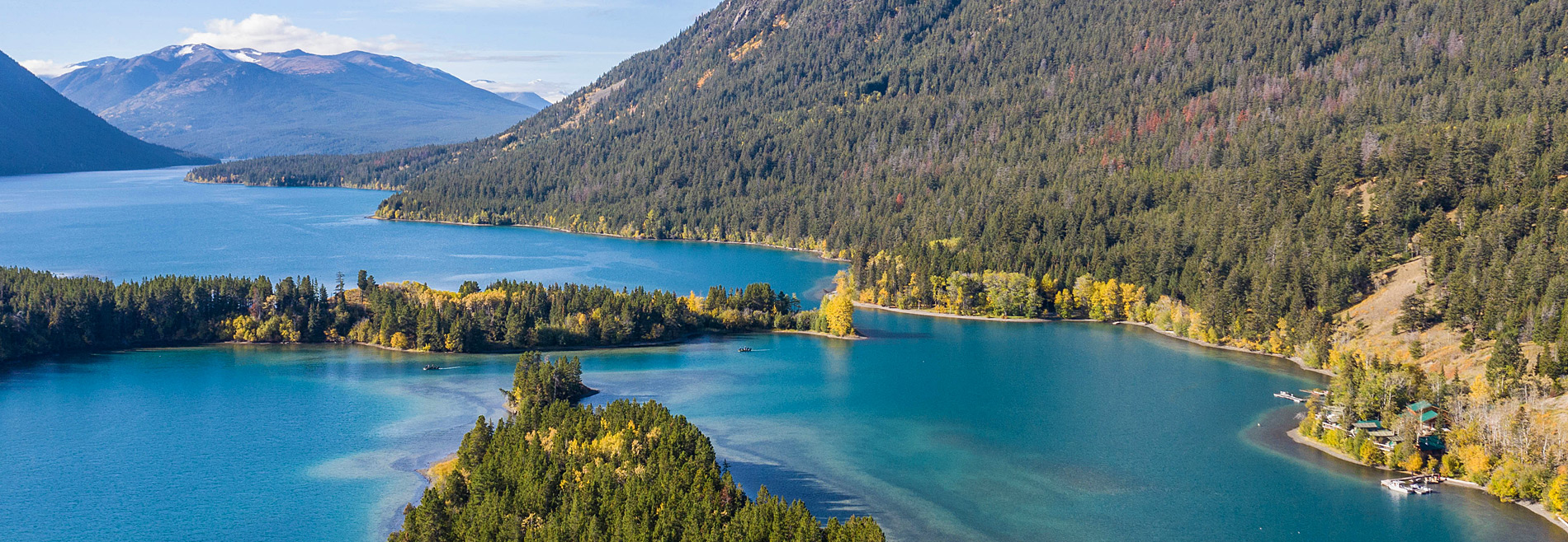 Turquoise waters of Chilko Lake as seen from the air over Bear Camp